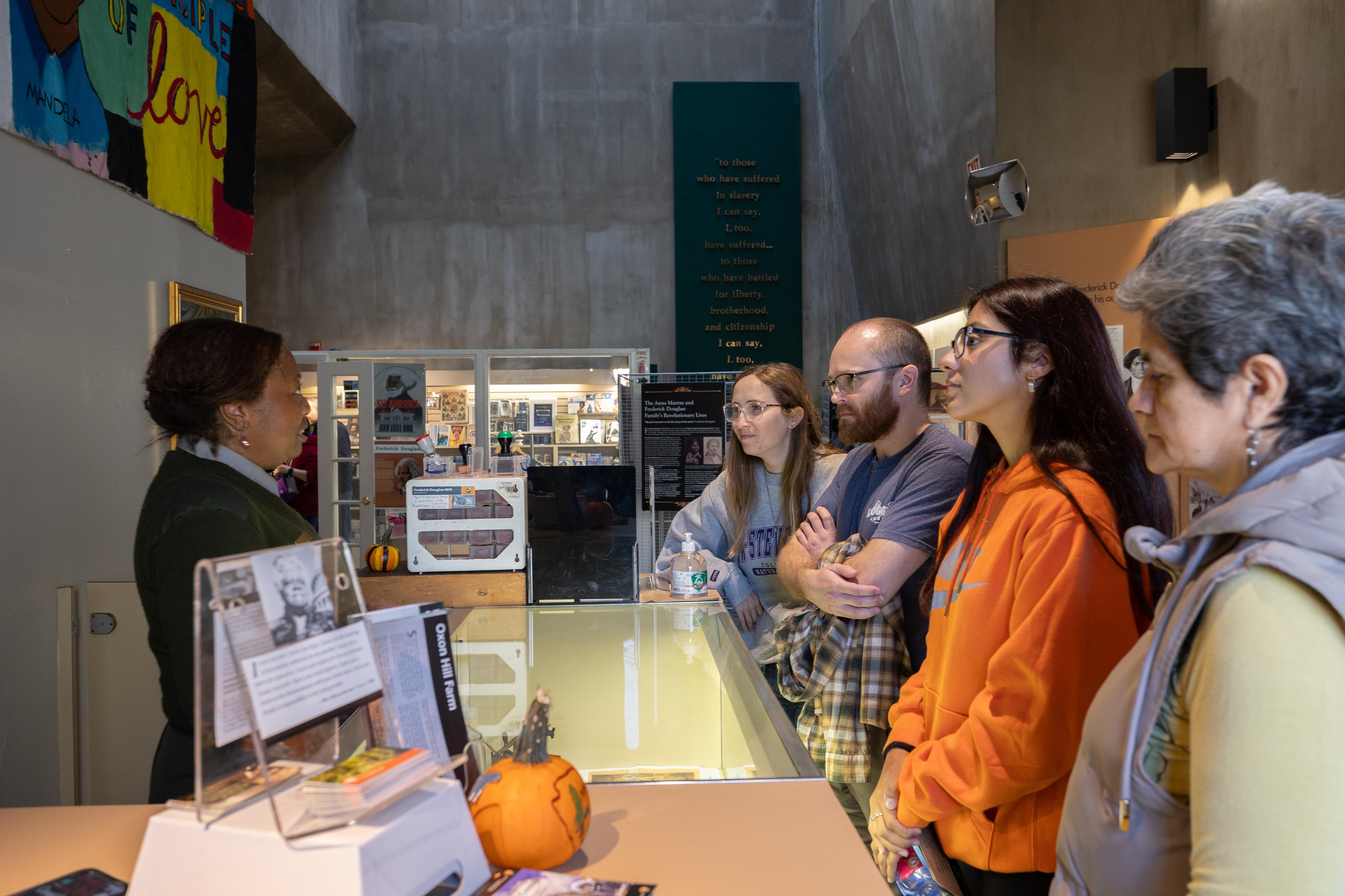A Park Ranger gives information in the Frederick Douglass Visitor Center